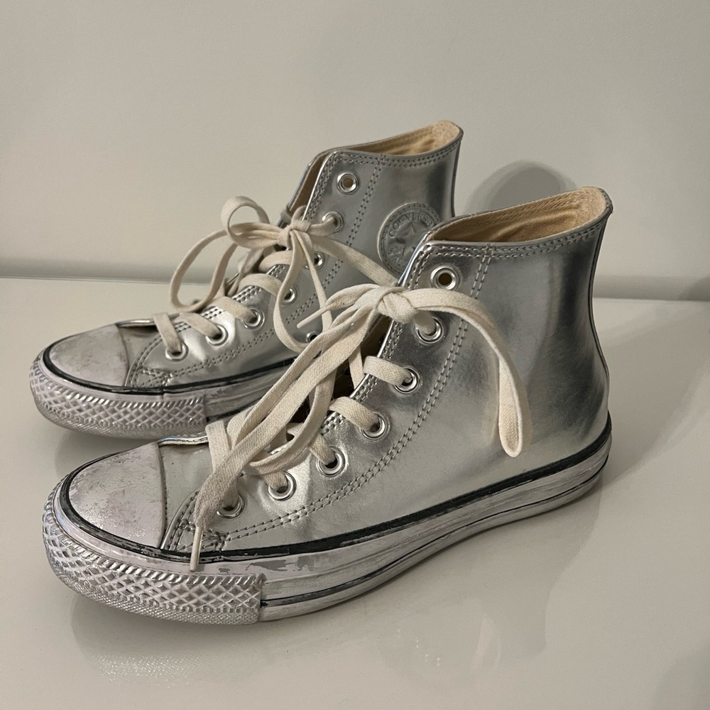 Converse distressed chrome silver high top sneakers